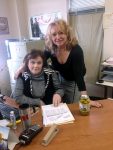 photo - Millie Krause, who runs Elman’s, with receptionist Bonita Bouchard