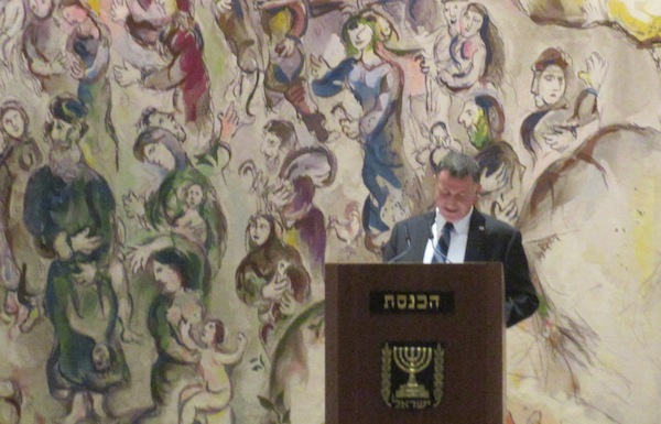 photo - Yuli-Yoel Edelstein, speaker of the Knesset, addresses delegates in the parliament’s Chagall Hall