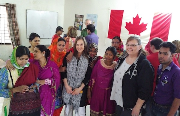photo - Marianne Hladun, second from the right, and fellow delegation member Melanie McConnell (chair of Women of Steel committee for USW Local 7619, Kamloops, B.C.), fifth from the right, at the Bangladesh Centre for Worker Solidarity in 2016. The other women are volunteers who work to promote unions in the factories, and health and safety