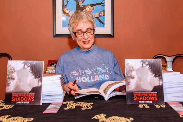 photo - Janet Wees at a book signing for her novel When We Were Shadows, which she’ll be bringing to the Cherie Smith JCC Jewish Book Festival on Feb. 10