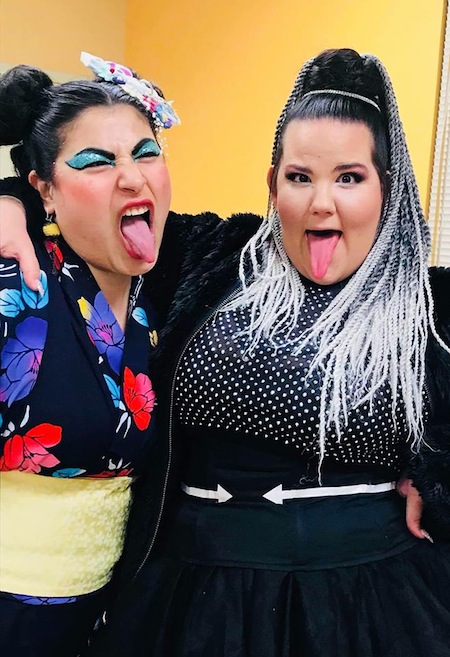 photo - Eurovision 2018 winner Netta Barzilai, right, with Carmel Tanaka, emcee of the night with IQ 2000 Trivia