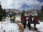photo - BaMidbar students hike in all weather conditions, learning to live and care for themselves in outdoor environments