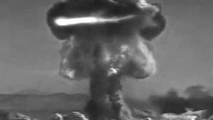 photo - A single frame from Reva Stone’s Atomic Bomb video piece