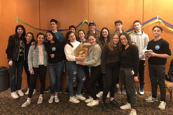 photo - Teens from CTeens, NCSY and BBYO joined together for the Not Your Bubbies’ Babka Bake at Congregation Schara Tzedek on March 7