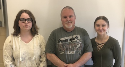 photo - Springfield Collegiate Institute student Ana Palidwor, left, teacher James Chagnon, centre, and student Madison Stojak
