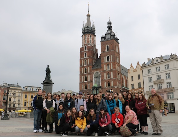 photo - The 30 Springfield Collegiate Institute students, three parent chaperones and two teachers in the old town square in Krakow, Poland