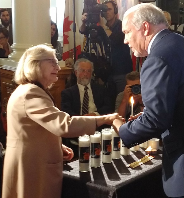 photo - Holocaust survivor Rita Akselrod and Premier John Horgan at the Yom Hashoah commemoration that took place at the British Columbia legislature May 2