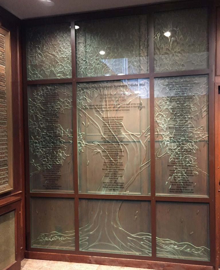 photo - The Schara Tzedeck Shoah Survivors Tribute Wall was created for the congregation by John Nutter. The sculpture, which includes the names of 230 survivors, was dedicated May 3