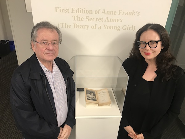 photo - Dr. Robert Krell and VHEC executive director Nina Krieger at the display case for Het Achterhuis, a first edition of Anne Frank’s Diary of a Young Girl