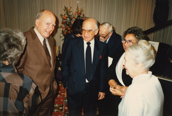 photo - People socializing at an unidentified event, possibly a University of British Columbia event in honour of Harry Adaskin, 1985