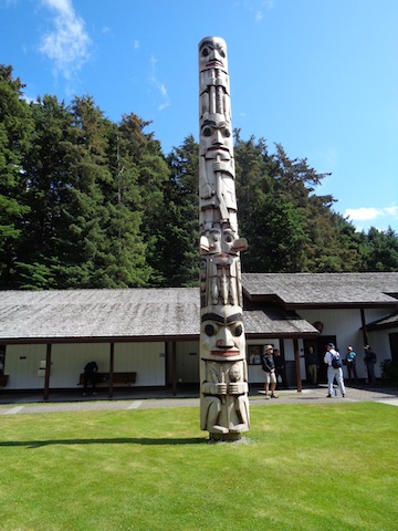 photo - A Tlingit totem pole on grounds of Sitka’s Totem Park
