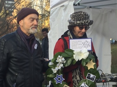 photo - Henry Grayman and Deborah Ross-Grayman with the Holocaust wreath at the memorial last year