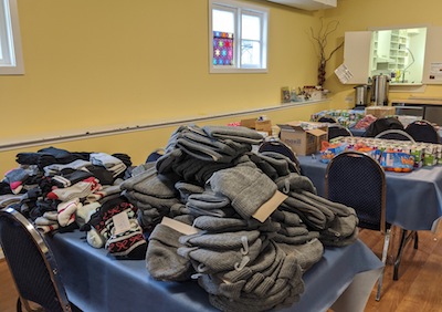 photo - Some of the items Interfaith Youth BC participants assembled into care packages to distribute in Downtown Eastside on Dec. 8