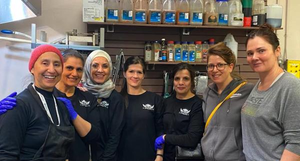 photo - The interfaith initiative at Boyle Street Community Services was led by Nesrine Merhi-Tarrabain, third from the left, and Rabbi Gila Caine, second from the right