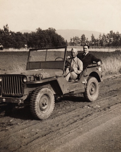 photo - Moe Berg in a military jeep in California with his brother Sam during the war, July 1942