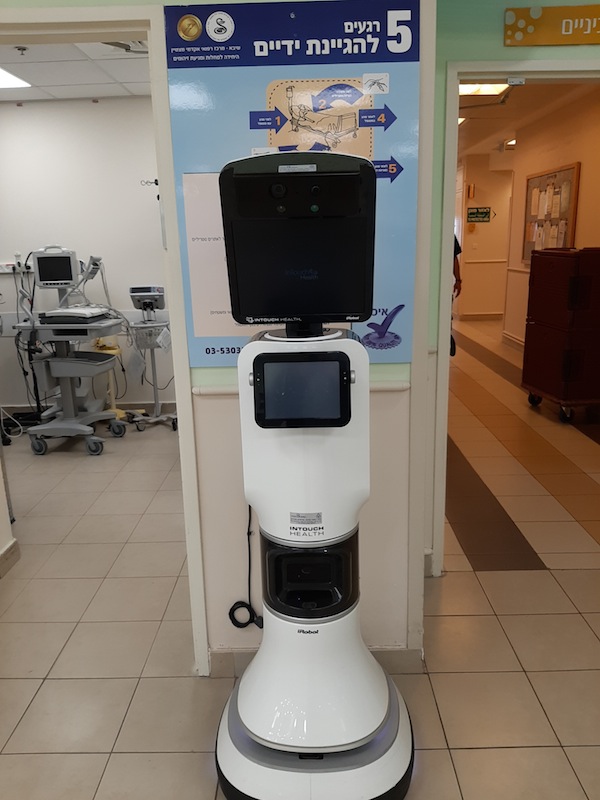 photo - One high-tech solution for patients possibly infected with the coronavirus is a robot that can enter the patient’s room and be controlled by medical staff from the outside