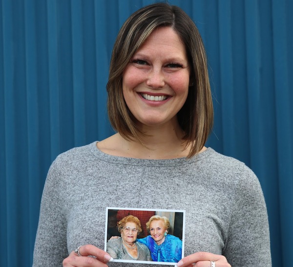 photo - Courtney Cohen holds a photo of her grandmothers, Rose Lewin, left, and Babs Cohen