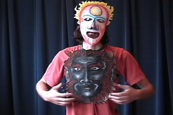 photo - A participant in Yehudit Silverman’s The Story Within process shows off their self-made mask