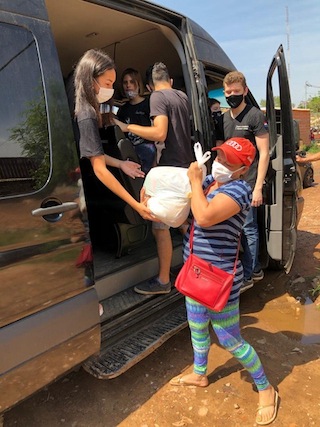 photo - The students of the Recycled Orchestra, along with the Orchestra’s Parents Association, have become the hub of relief services