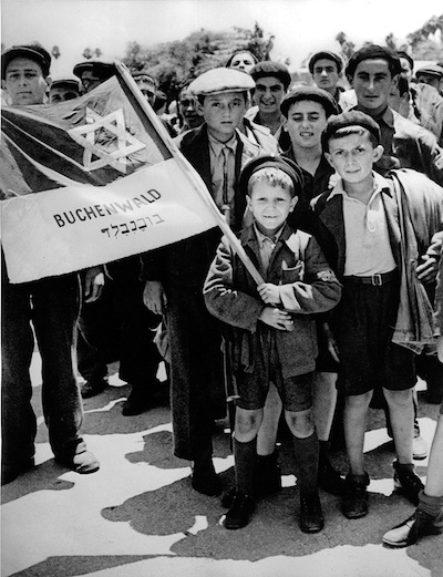 photo - Tim Gidal took this photograph of Buchenwald survivors arriving in Palestine in 1945. It is one of the images featured in the exhibit Invisible Curtain, on display until Feb. 25