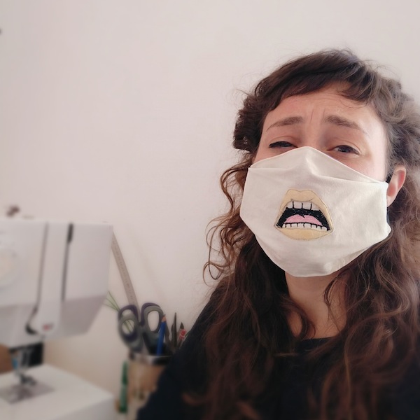 photo - A Stitches by Orli mask, modeled by the designer Orli Fields