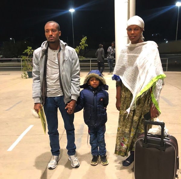 photo - Six-year-old Biniyam Tesfahun with his family shortly before being transported to Israel for heart surgery