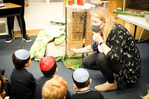 photo - Beekeeper Carolyn Essaunce speaks to VTT senior kindergarteners about bees and honey