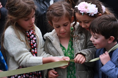 photo - The younger generation of the Dayson/Barnett family cut the ribbon at the opening of Tikva Housing Society’s Ben and Esther Dayson Residences