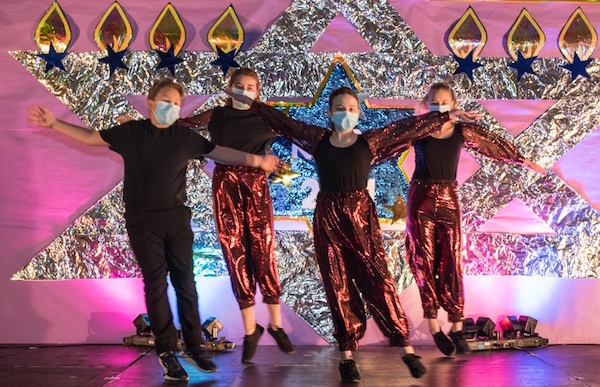 photo - RJDS students perform an Israeli dance.