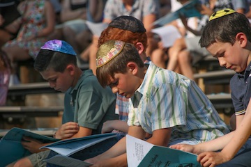 photo - Boys during a service at Camp Hatikvah