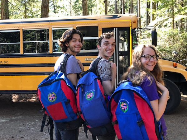 photo - Judah Altman, left, Daniel Fine and Marina Levy all packed up for the bus