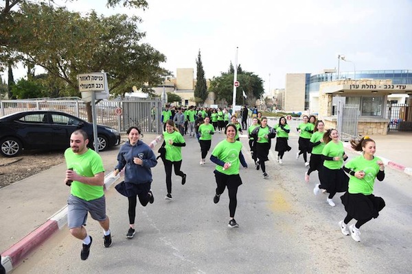 photo - Vancouverite Vida Sussman (centre) was among those who pounded the pavement at ADI Negev-Nahalat Eran rehabilitation village to raise disability awareness at ADI’s first annual Race for Inclusion, which took place Dec. 29