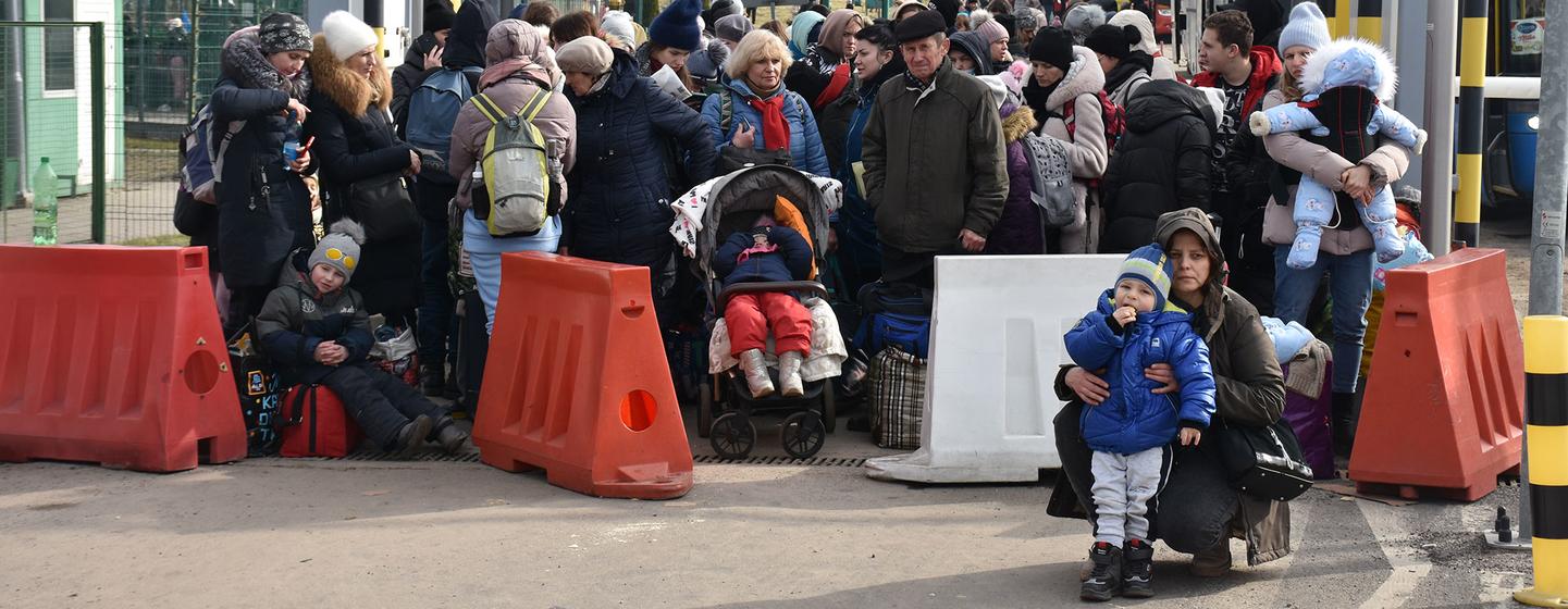 photos - Refugees entering Poland from Ukraine at the Medyka border crossing point