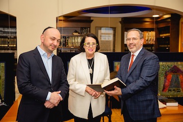 photo - Ezra Shanken, left, with Lt. Gov. Janet Austin and Schara Tzedeck Synagogue’s Rabbi Andrew Rosenblatt.