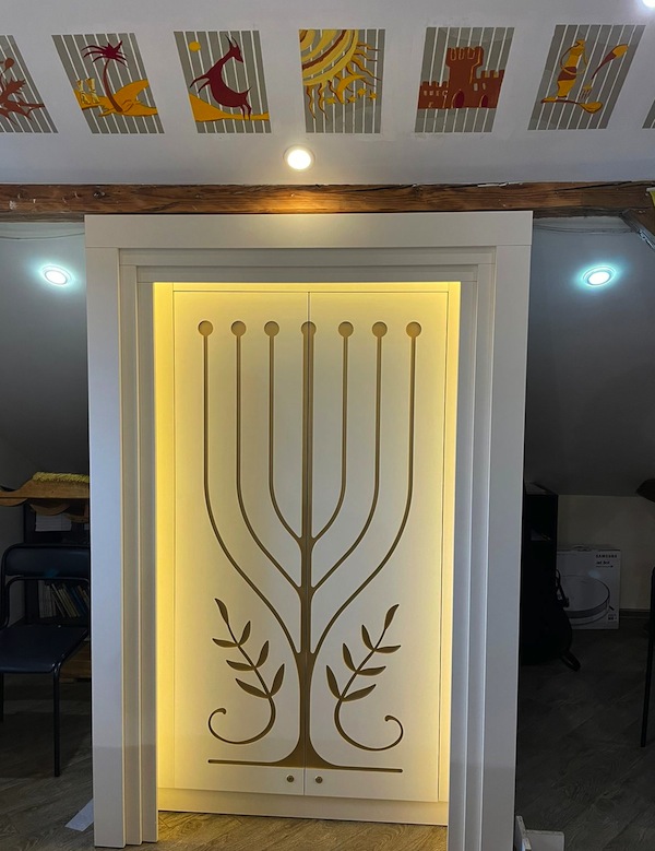 photo - The Masorti synagogue in Chernivtsi Ukraine has become a refuge for Ukrainians fleeing the war. Its new aron kodesh, built by grateful refugees, has become a symbol of the partnership being forged between small, out-of-the-way communities and those fleeing for safety