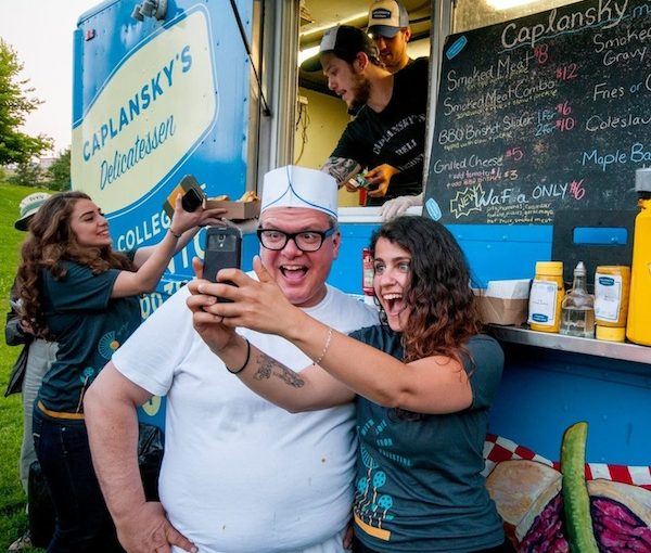 photo - A Caplansky’s Deli fan takes a selfie with the restaurant’s founder, Zane Caplansky