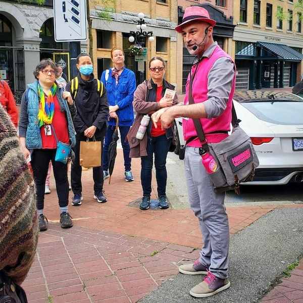 photo - Glenn Tkach explains some of Gastown’s lesser-known history to tour participants