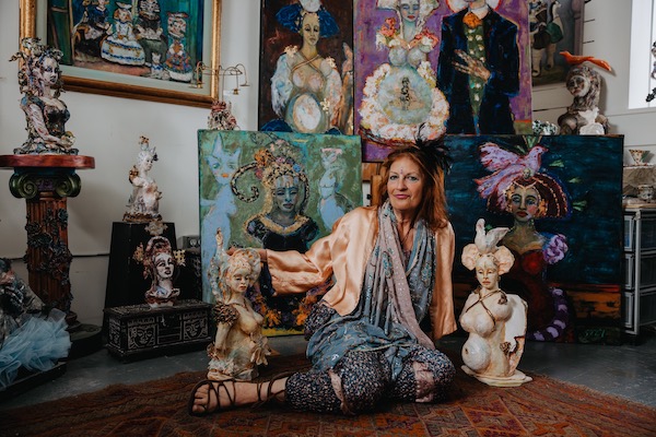 photo - Suzy Birstein amid her work, some of which visitors to her studio will see during the East Side Culture Crawl