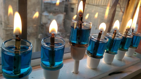 photo - The reason that is ascribed to the House of Hillel for the custom that we follow in lighting the candles is that we go upwards in holiness