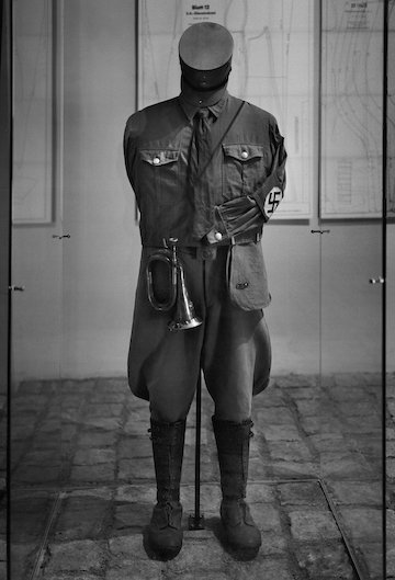photo - A Nazi uniform in the Sachsenhausen concentration camp museum in Berlin. (photo by Jason Langer)