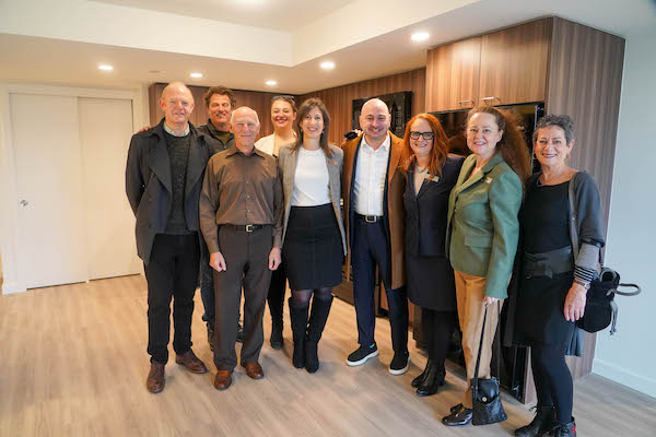 photo - Supporters of Tikva Housing in one of the units at Dogwood Gardens on Jan. 10, left to right: Stephen Gaerber, Gord Kushner, Bernard Pinsky, Rory Richards, Anat Gogo, Ezra Shanken, Rhonda Sacks, Sheila Sontz and Daniella Givon