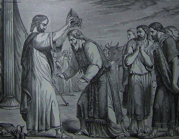 photo - “Consecration of Aaron and His Sons,” an illustration from the 1890 Holman Bible, 1890. Aaron’s high priest attire is elaborately described in the Hebrew Bible