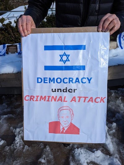 photo - Democracy under Criminal Attack poster 