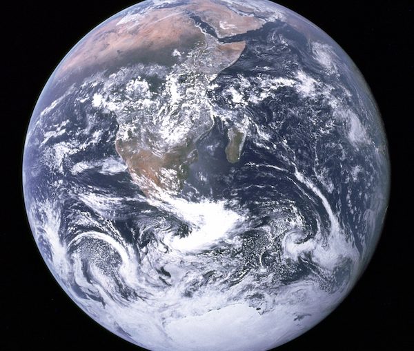 photo - The southern and northern hemispheres look equally bright in this iconic image of earth, titled “The Blue Marble,” which the crew of the Apollo 17 spacecraft took on Dec. 7, 1972