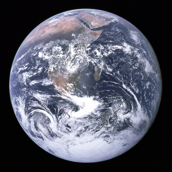 photo - The southern and northern hemispheres look equally bright in this iconic image of earth, titled “The Blue Marble,” which the crew of the Apollo 17 spacecraft took on Dec. 7, 1972