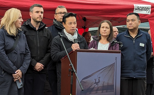 photo - Vancouver mayor Ken Sim, flanked by councillors, committed to fight antisemitism