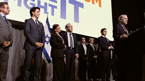 photo - Among those on stage as Irwin Cotler received a lifetime achievement award from the Centre for Israel and Jewish Affairs last month were, left to right, Yves-François Blanchet (Bloc Quebecois leader), Prime Minister Justin Trudeau, Ariela and Irwin Cotler, David Posluns (one of the event co-chairs), Steven Kroft (one of the event co-chairs), Pierre Poilievre (Conservative Party leader) and Shimon Koffler Fogel (head of CIJA)