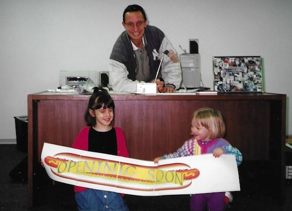 photo - Eppy Rappaport with daughters Aviva, left, and Lauren before the opening of Omnitsky’s