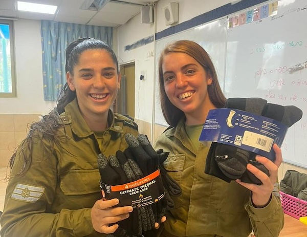 photos - The rabbis delivered warm clothing, including socks, to Israeli soldiers