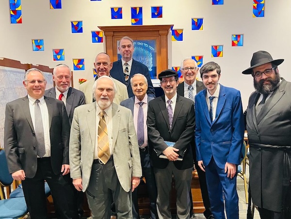 photo - Rabbi Meir Kaplan, far right, with Cantor Yaacov Orzech (back) and the Kol Simcha Singers at Chabad of Victoria prior to the Dec. 22-23 Shabbaton